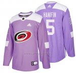 Camiseta Carolina Hurricanes Noah Hanifin Hockey Fights Cancer Violeta Camiseta Carolina Hurricanes Noah Hanifin Hockey Fights Cancer Violeta