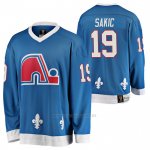 Camiseta Hockey Quebec Nordiques Joe Sakic Heritage Vintage Replica Azul Camiseta Hockey Quebec Nordiques Joe Sakic Heritage Vintage Replica Azul